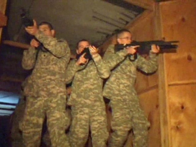 Soldiers learn how to handle combat situations inside Haunted House.
